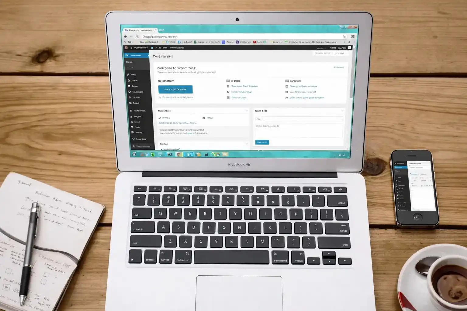 WordPress admin dashboard displayed on a laptop and a mobile phone, showcasing mobile compatibility.